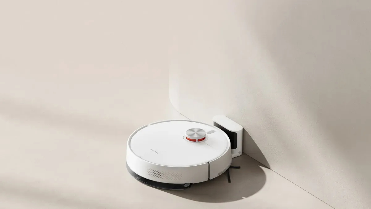 Robô aspirador Xiaomi S40 em funcionamento sobre piso de porcelanato branco